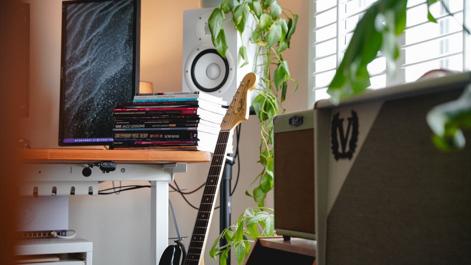 Chris Hall's studio — guitars, amps and a tracking desk